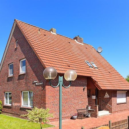 Ferienwohnungen Im Haus Waterkant Neuharlingersiel Bagian luar foto