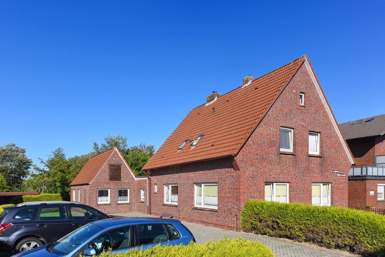 Ferienwohnungen Im Haus Waterkant Neuharlingersiel Bagian luar foto