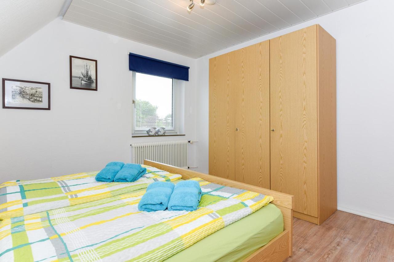 Ferienwohnungen Im Haus Waterkant Neuharlingersiel Bagian luar foto