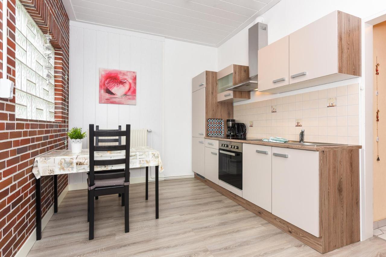 Ferienwohnungen Im Haus Waterkant Neuharlingersiel Bagian luar foto