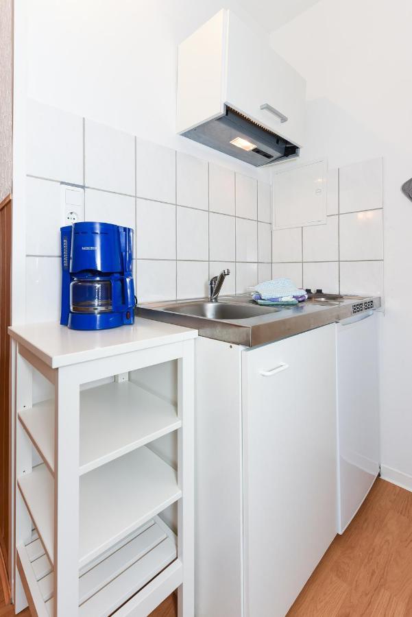 Ferienwohnungen Im Haus Waterkant Neuharlingersiel Bagian luar foto