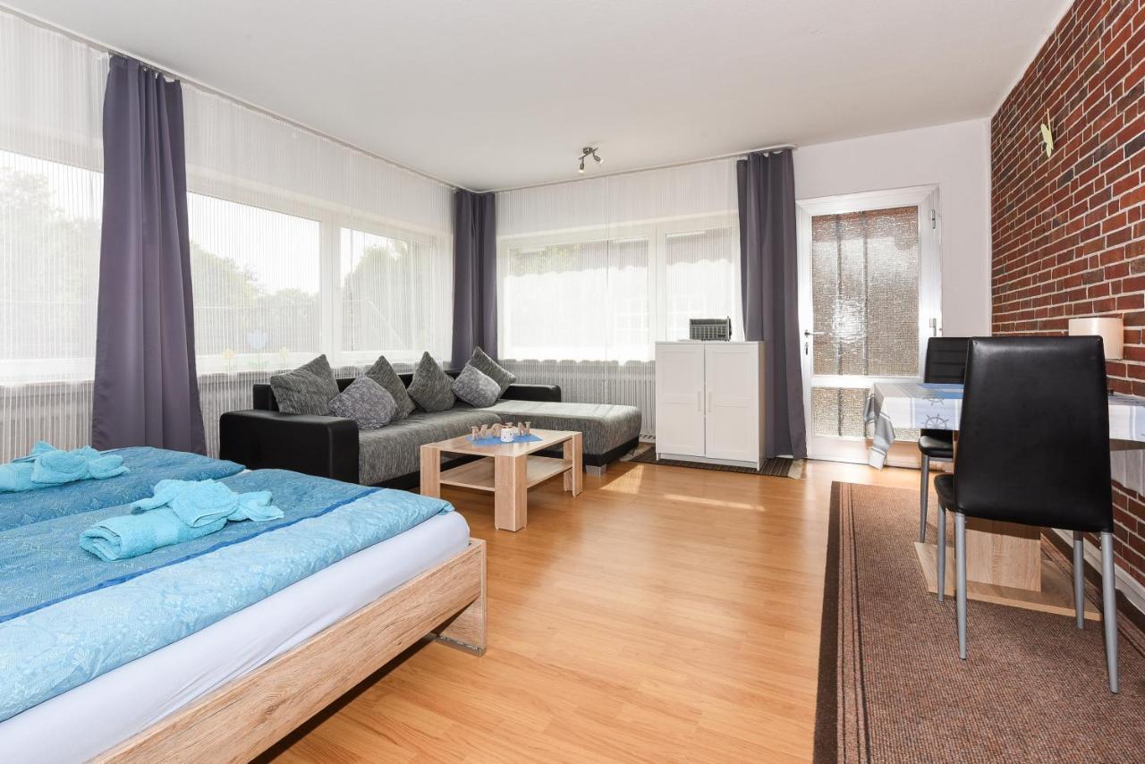 Ferienwohnungen Im Haus Waterkant Neuharlingersiel Bagian luar foto