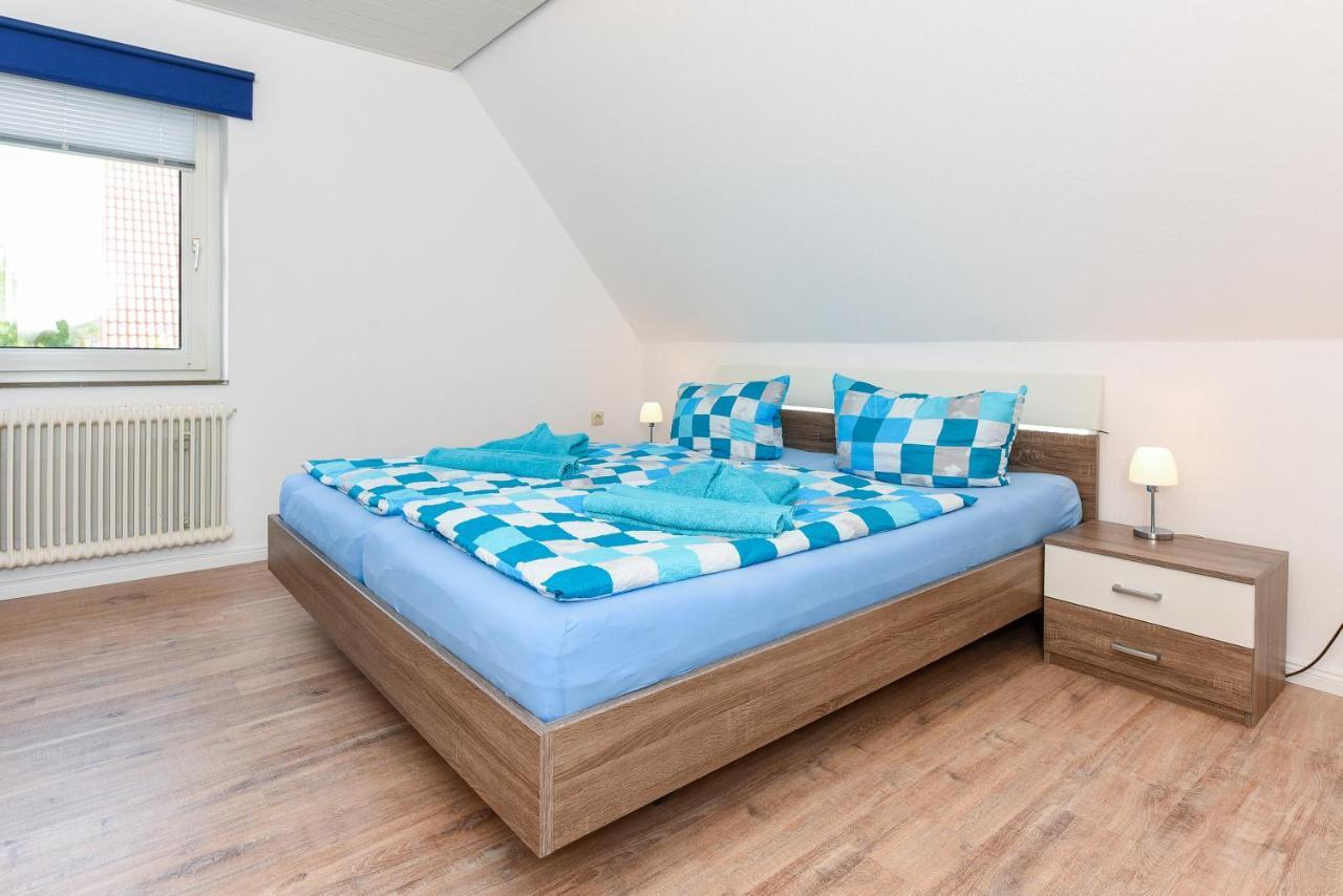 Ferienwohnungen Im Haus Waterkant Neuharlingersiel Bagian luar foto