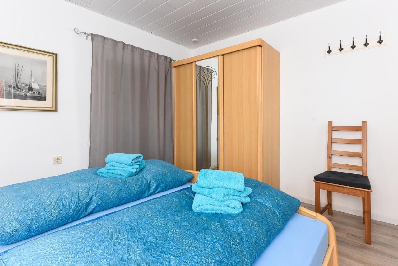 Ferienwohnungen Im Haus Waterkant Neuharlingersiel Bagian luar foto