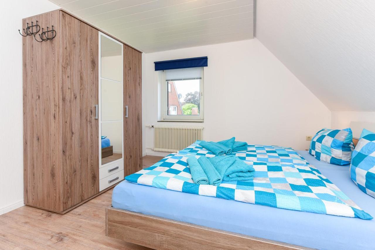 Ferienwohnungen Im Haus Waterkant Neuharlingersiel Bagian luar foto