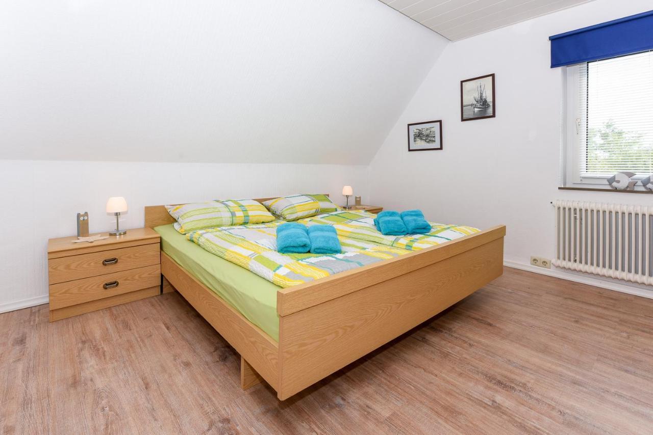 Ferienwohnungen Im Haus Waterkant Neuharlingersiel Bagian luar foto