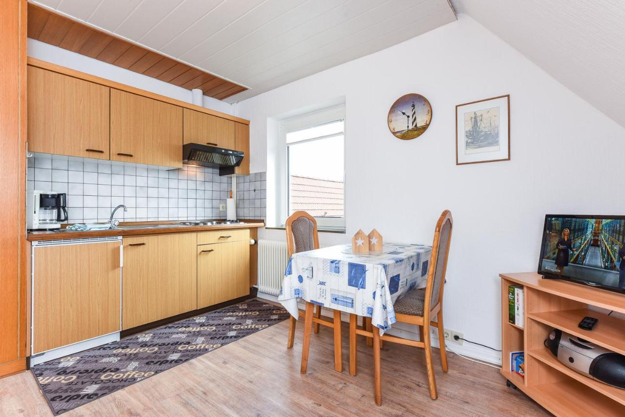 Ferienwohnungen Im Haus Waterkant Neuharlingersiel Bagian luar foto